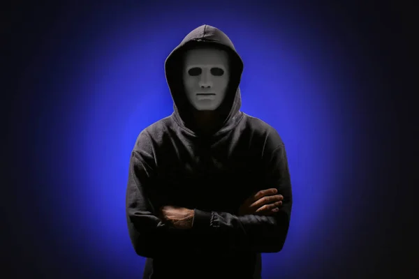 Professional hacker in mask on dark background — 스톡 사진