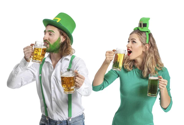 Young couple with beer on white background. St. Patrick's Day celebration — 스톡 사진