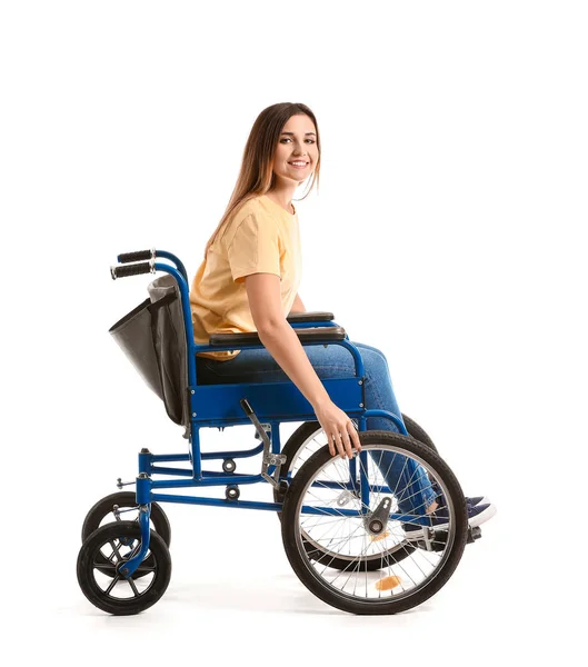 Handicapped young woman in wheelchair on white background — Stock Photo, Image