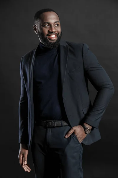 Stylish African-American man on dark background — Stock Photo, Image