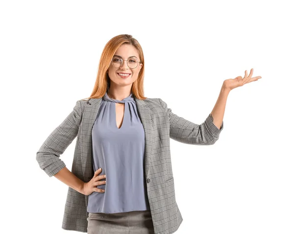 Portrait of beautiful businesswoman showing something on white background — Stock Photo, Image