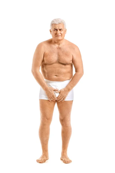 Uomo maturo con malattia urologica su sfondo bianco — Foto Stock
