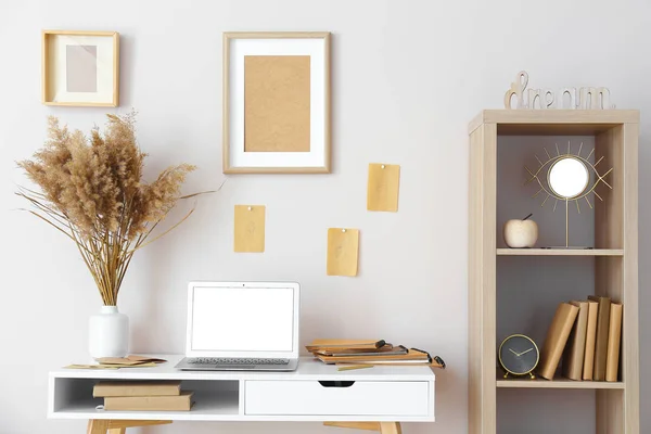 Stylish comfortable workplace with laptop in modern room — Stock Photo, Image