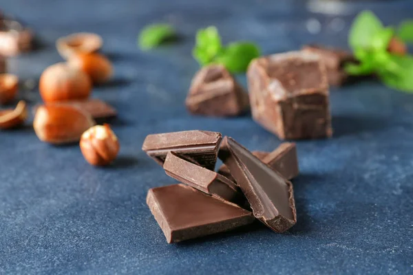Tasty chocolate on dark background — Stock Photo, Image