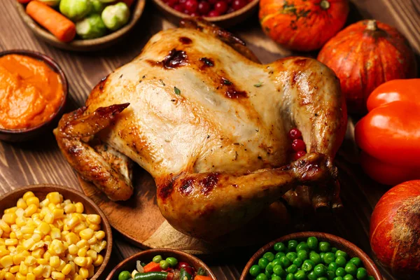 Tasty baked turkey and other dishes for Thanksgiving day on table — Stock Photo, Image