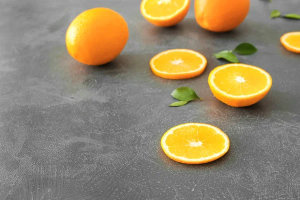 Sweet oranges on grey background — Stock Photo, Image