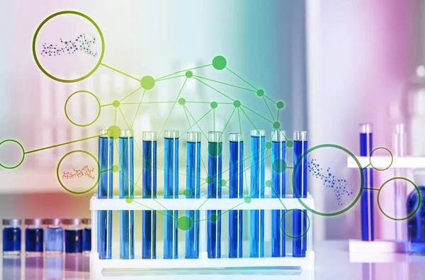 Test tubes with samples on table in laboratory — Stock Photo, Image