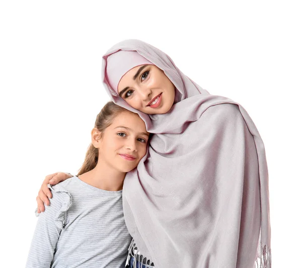 Portrait of Muslim woman with daughter on white background — Stock Photo, Image