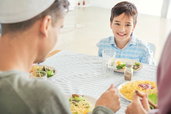 Muslim family having dinner at home — Stock Photo, Image