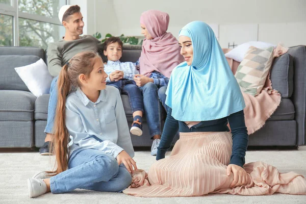 Portrait of happy Muslim family at home — Stock Photo, Image