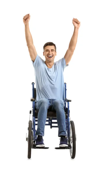 Szczęśliwy młody człowiek na wózku inwalidzkim na białym tle — Zdjęcie stockowe