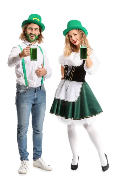 Young couple with beer on white background. St. Patrick's Day celebration — Stock Photo, Image