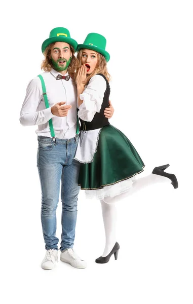 Young couple on white background. St. Patrick's Day celebration — Stock Photo, Image