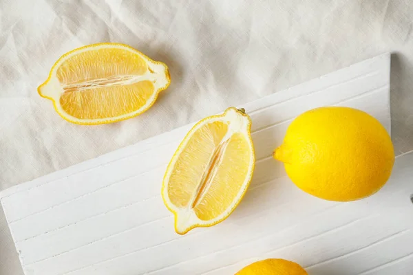 Fresh ripe lemons on table — Stock Photo, Image