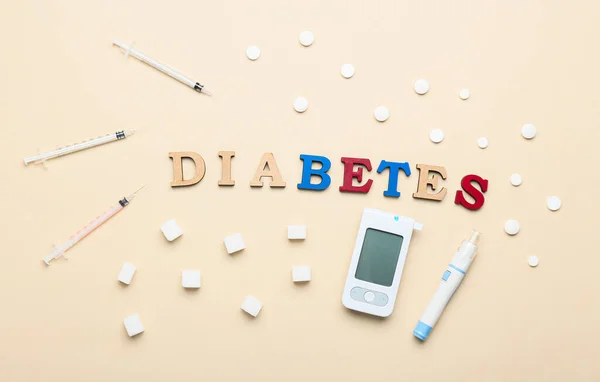 Composition with word DIABETES on color background — Stock Photo, Image