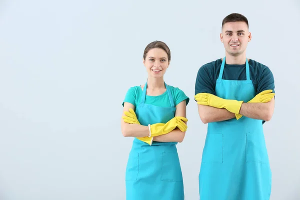 Portrait of janitors on light background — 스톡 사진