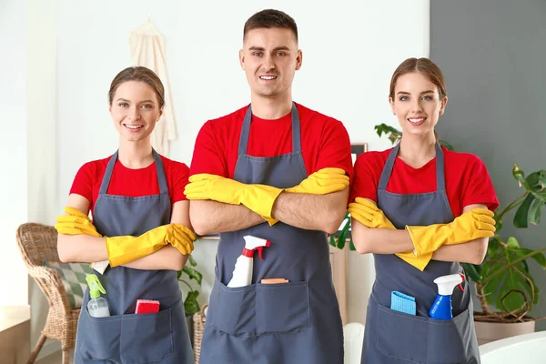 Team of janitors in bathroom — 스톡 사진