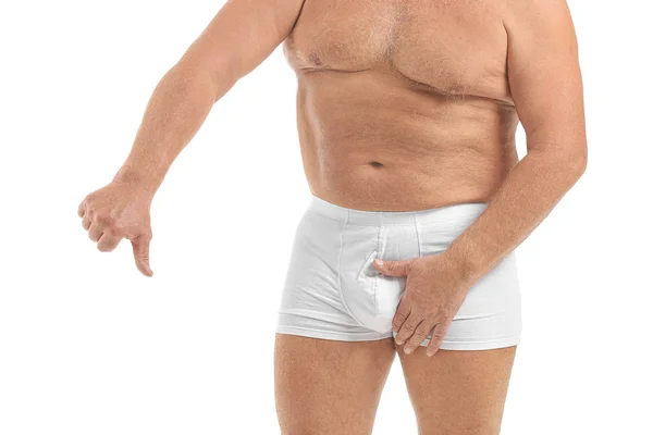 Volwassen man met urologische ziekte met duim naar beneden op witte achtergrond — Stockfoto