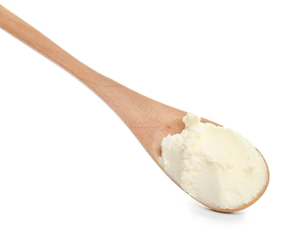 白い背景においしいクリームチーズのスプーン — ストック写真