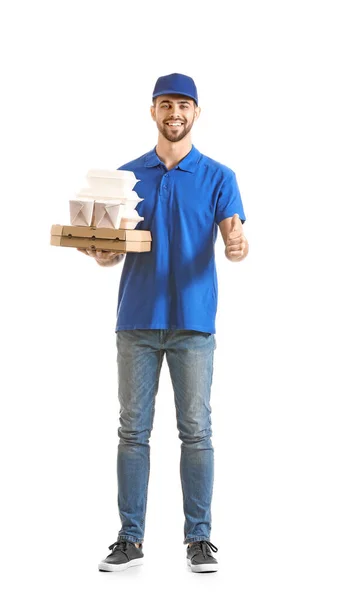 Handsome worker of food delivery service showing thumb-up on white background — 스톡 사진