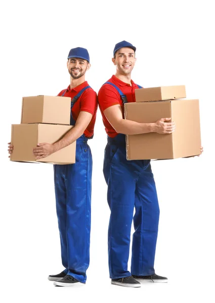 Delivery men with boxes on white background — Stock Photo, Image