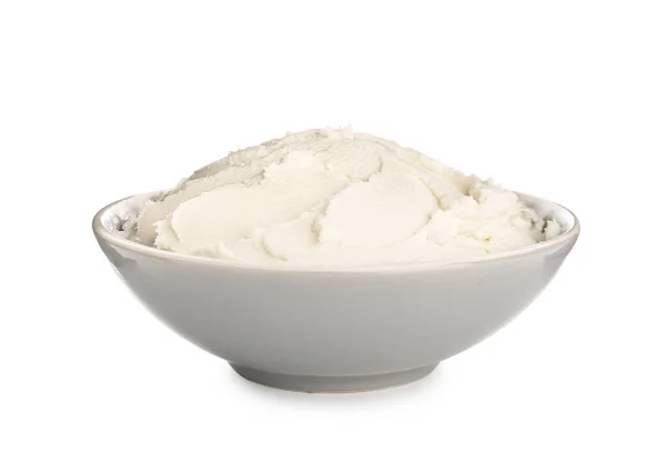 Bowl with tasty cream cheese on white background — Stock Photo, Image