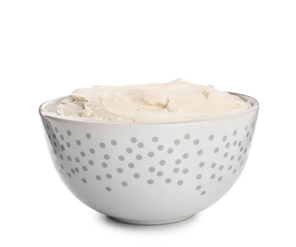 Bowl with tasty cream cheese on white background — Stock Photo, Image