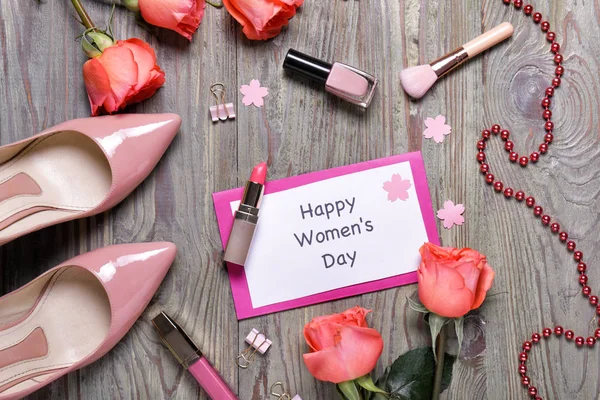 Composition for International Women's Day on wooden background — Stock Photo, Image