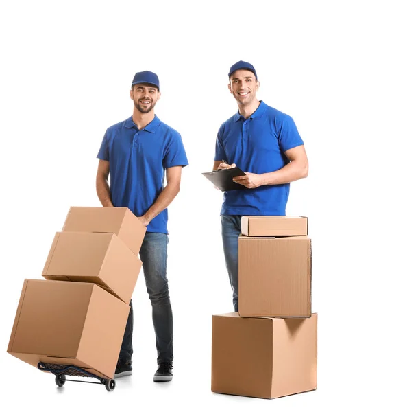 Delivery men with boxes on white background — Stock Photo, Image