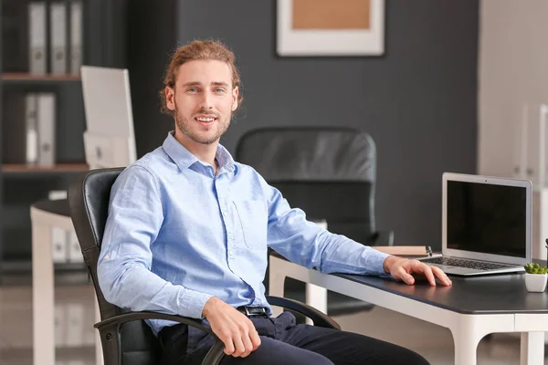 Portrait of handsome businessman in office — Stock Photo, Image