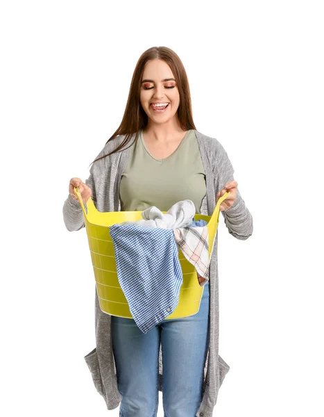 Beautiful young woman with laundry on white background — Stock Photo, Image