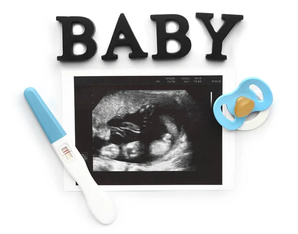 Τεστ εγκυμοσύνης, υπερηχογράφημα, λέξη Baby και πιπίλα σε λευκό φόντο — Φωτογραφία Αρχείου