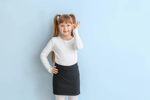 Cute little girl on color background — Stock Photo, Image