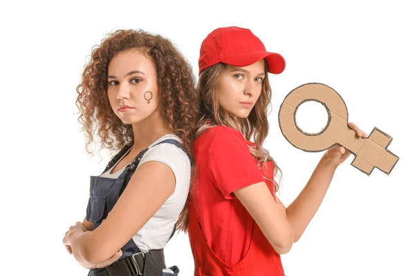 Lavoratrici con simbolo di donna sullo sfondo bianco. Concetto di femminismo — Foto Stock