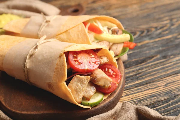 Tasty doner kebab on table — Stock Photo, Image