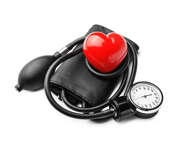 Sphygmomanometer with red heart on white background — Stock Photo, Image
