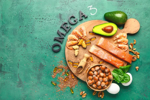 Set of healthy products with high omega 3 and fish oil pills on color background — Stock Photo, Image