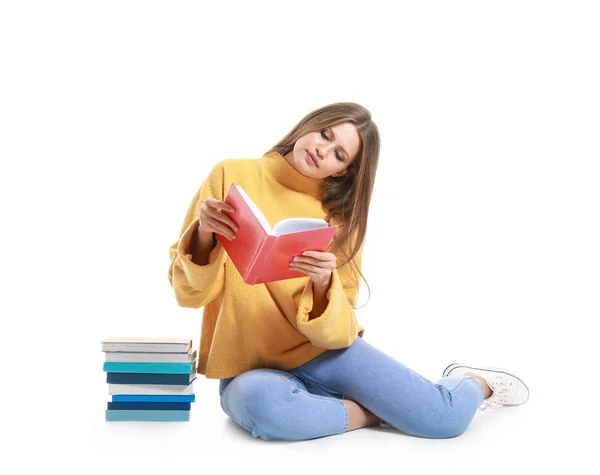 Mulher bonita com livros sobre fundo branco — Fotografia de Stock