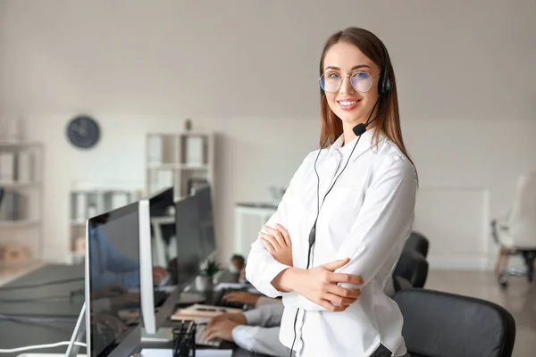 Portrait of female technical support agent in office — Stock Photo, Image