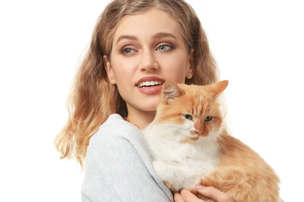 Beautiful young woman with cute cat on white background — Stock Photo, Image