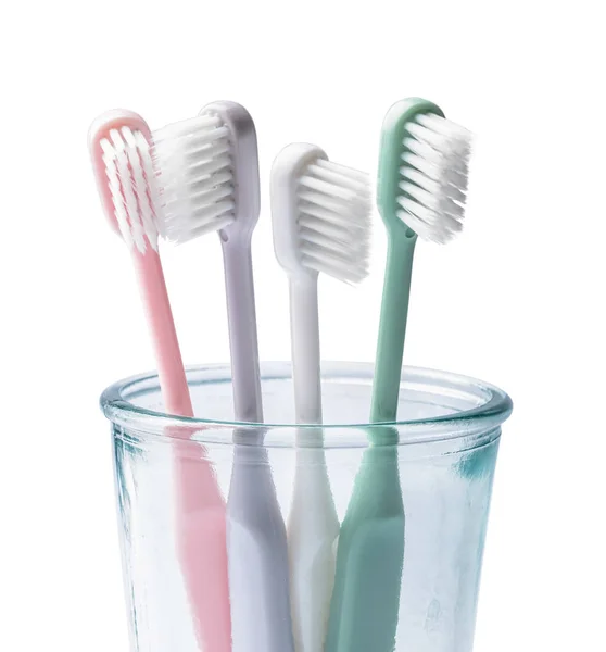 Holder with tooth brushes on white background — Stock Photo, Image