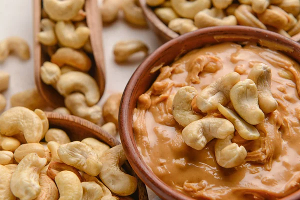 Bowl with cashew butter on table, closeup — Stock Photo, Image