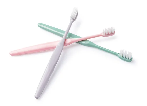 Different tooth brushes on white background — Stock Photo, Image