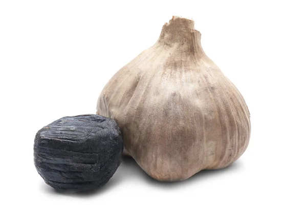 Black garlic on white background — Stock Photo, Image