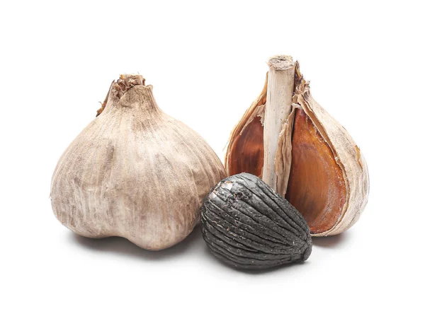 Black garlic on white background — Stock Photo, Image