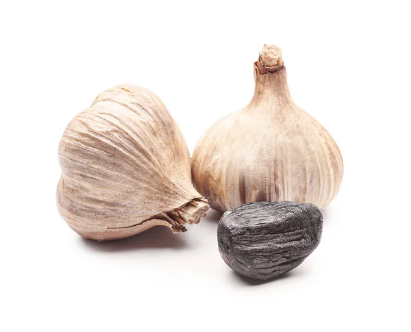 Black garlic on white background — Stock Photo, Image