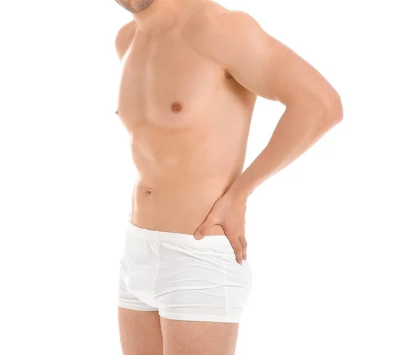 Handsome man in underwear on white background — ストック写真