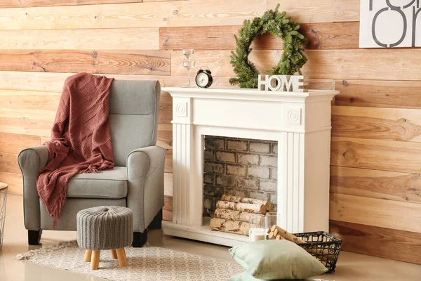 Interior of modern room with fireplace and Christmas decor — 스톡 사진
