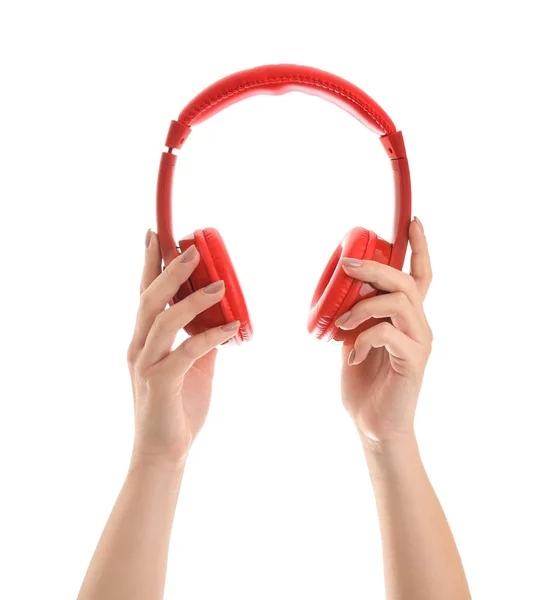 Mains avec écouteurs modernes sur fond blanc — Photo