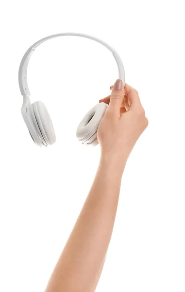 Main avec écouteurs modernes sur fond blanc — Photo